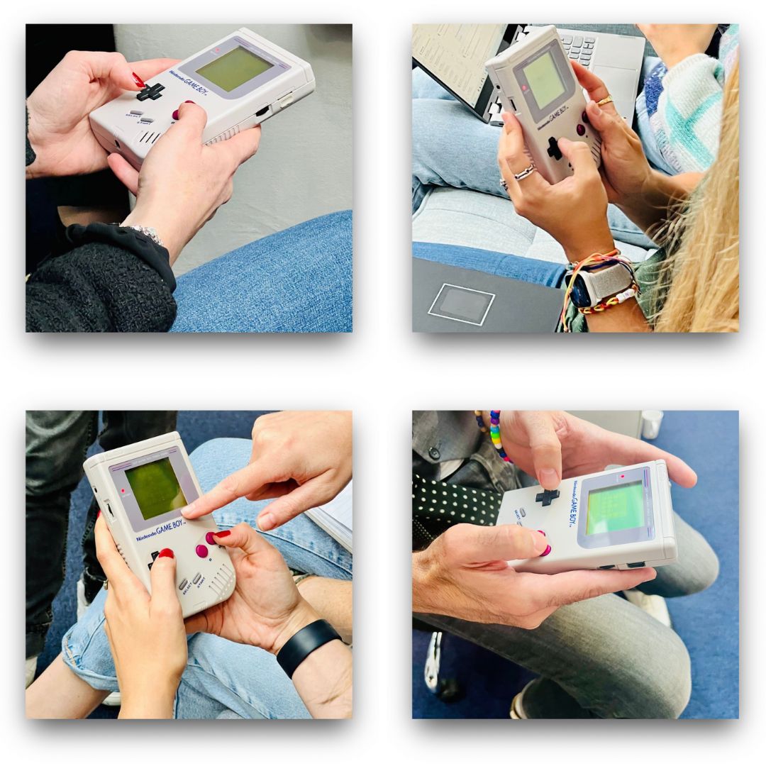 Game Boy in the hands of the participants playing the game